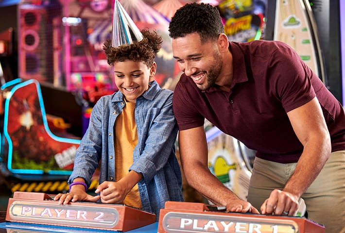 A father and child playing games